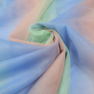 結婚披露宴のテュルのメッシュ生地の装飾の女の子はDIYの服の100%のPolyesteまわりを回る