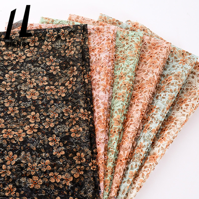 卸売良質ポリエステル テュルの生地の注文の印刷物の刺繍の網は服のための生地を印刷した